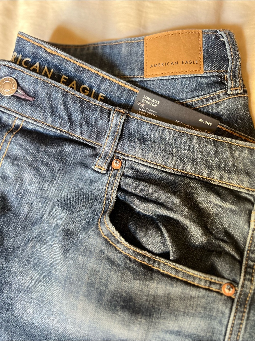 American Eagle Outfitters Womenβs Blue Low-Rise Stretch Jeans